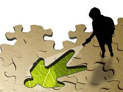 a shadow of a person seeing a human like shaped hole on the floor
